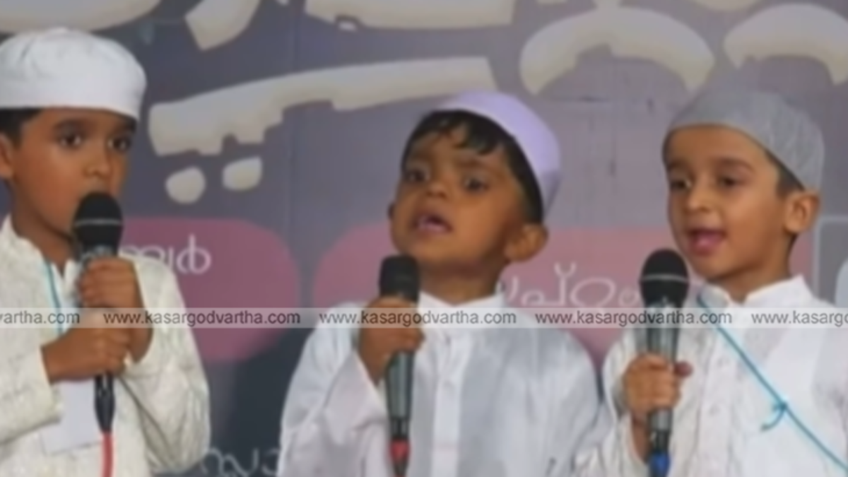 Three young madrassa students performing a song.