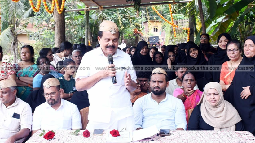 Participants of the 'Mazhappolima' festival planting rice in a field in Kasaragod.