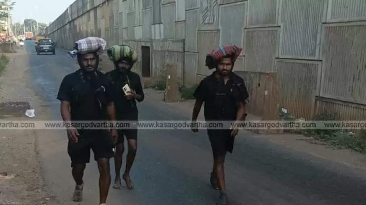 Ayyappa devotees walking on service roads due to highway construction