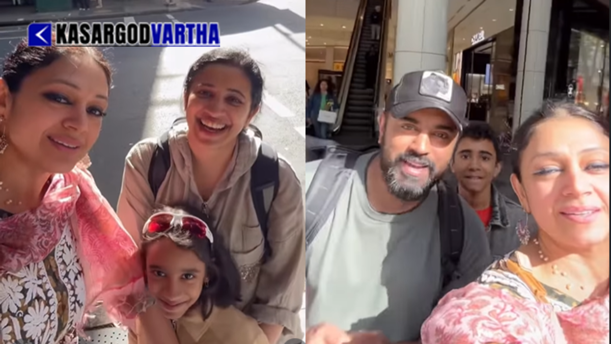 Elegant actress Shobana and actor Nivin Pauly posing happily with his family on a street in Brisbane, Australia.