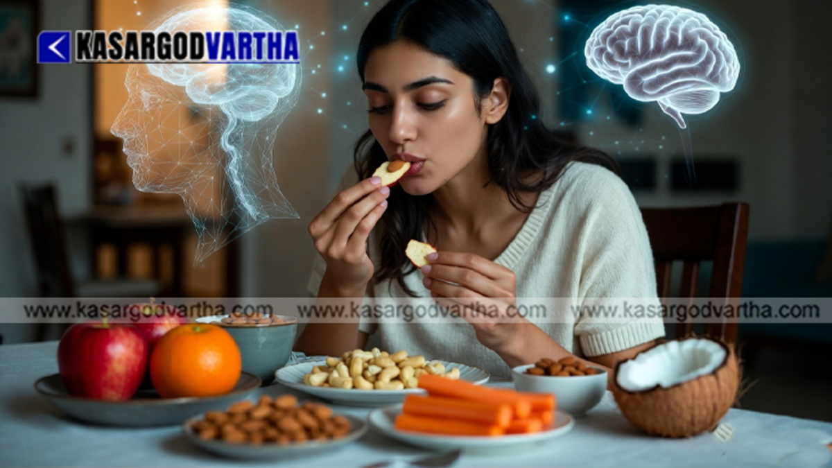 A healthy person mindfully chewing crunchy natural food like apples and nuts at a dining table.
