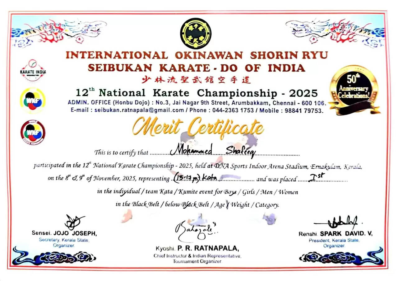 Shafeeq Hamsa with two medals and his coach Dominic Joseph.