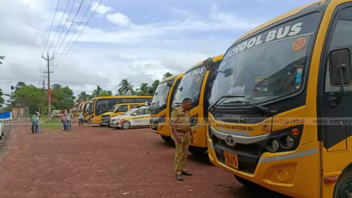Motor Vehicle Inspectors checking a school bus during an inspection.