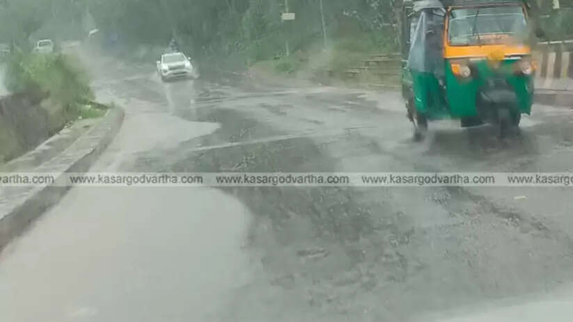 Damaged section of Kasaragod Kanhangad KSTP road with potholes