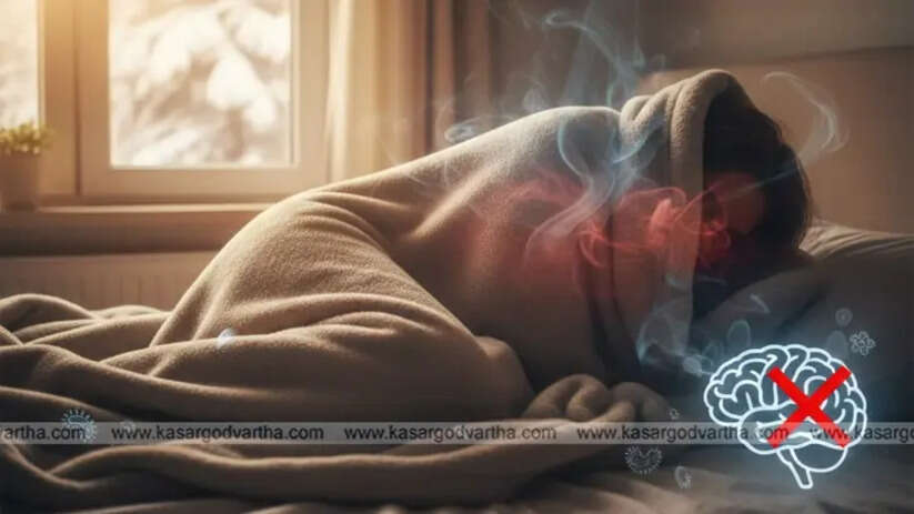 Person sleeping with face covered under a blanket.