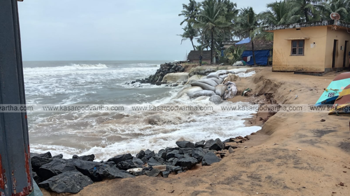 Damaged sea wall and coastal erosion in Kasaragod after heavy sea attack.