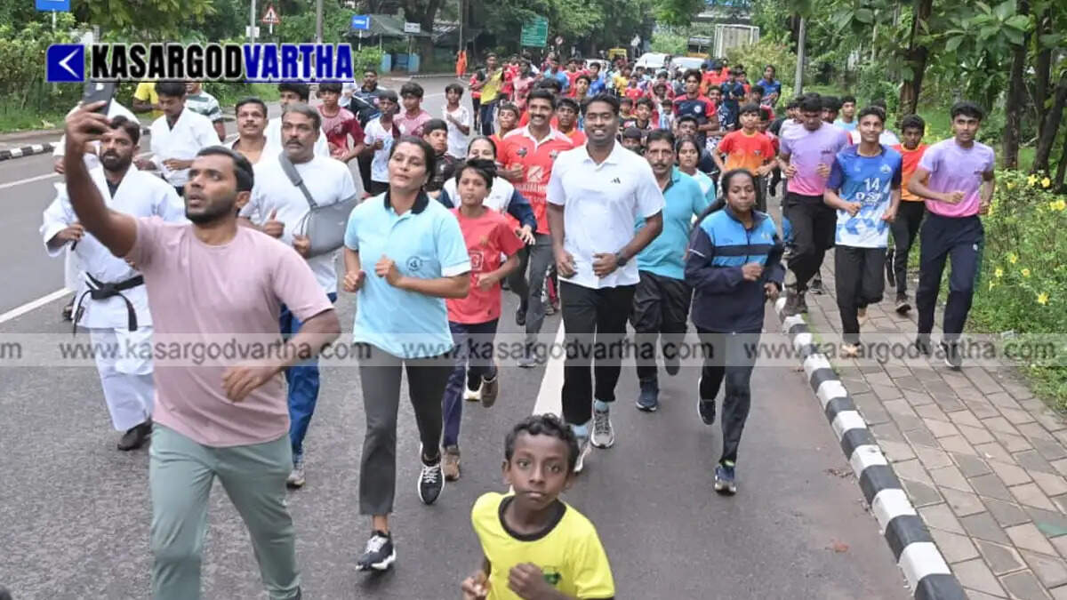 District Collector Arjun Pandian participating in the Olympics Run.