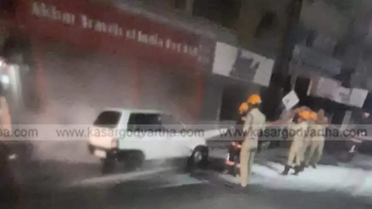 Running Car Catches Fire in Kasaragod City Heart at 4 AM Driver Narrowly Escapes Unharmed