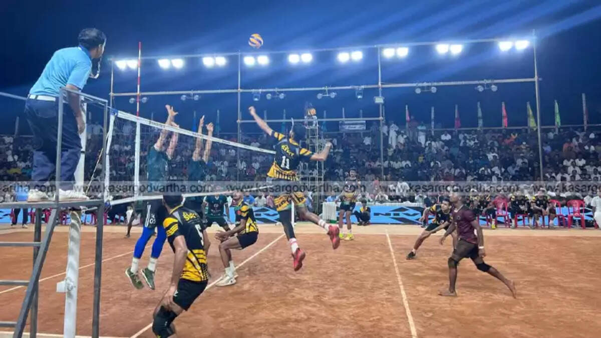 Volleyball match in progress at the All India Invitation Cup in Cherkala