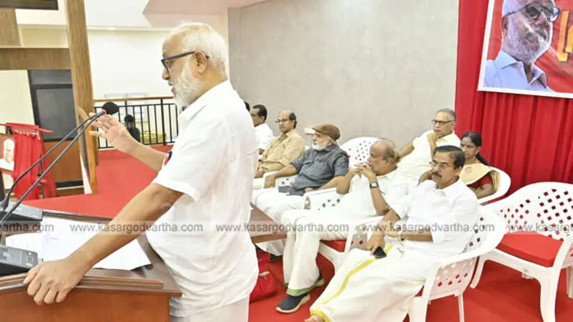 M.A. Baby speaking at a public event in Kasarcode.