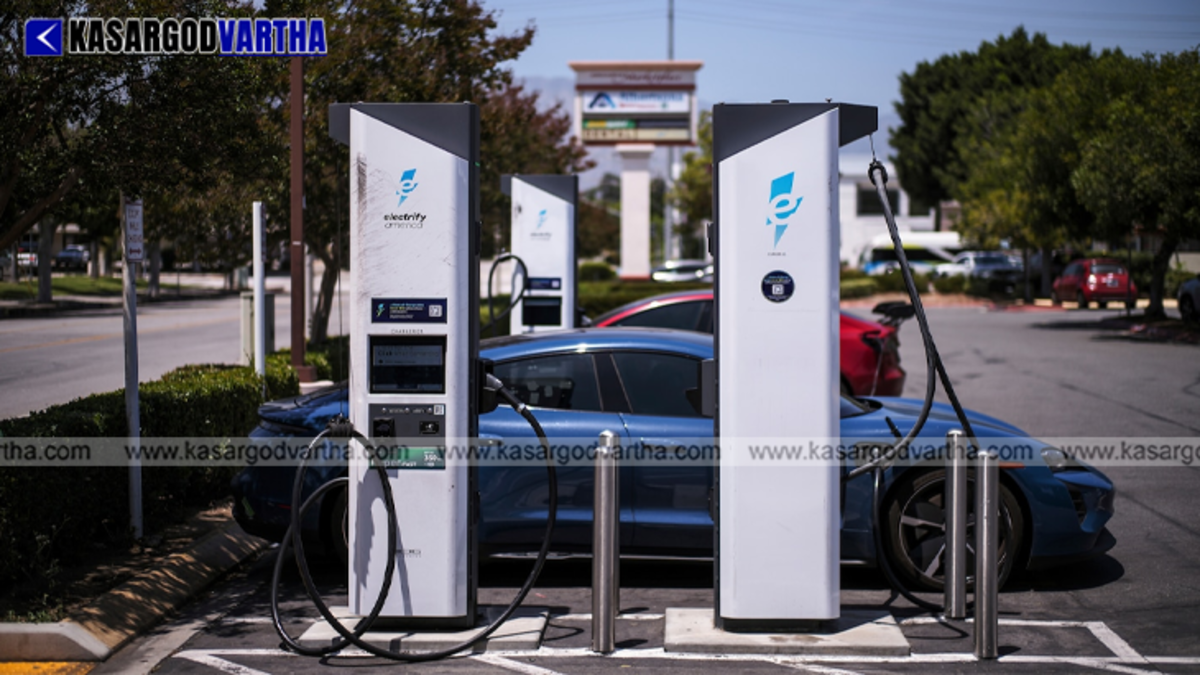 An electric vehicle being charged at a modern EV station, representing a sustainable business model.