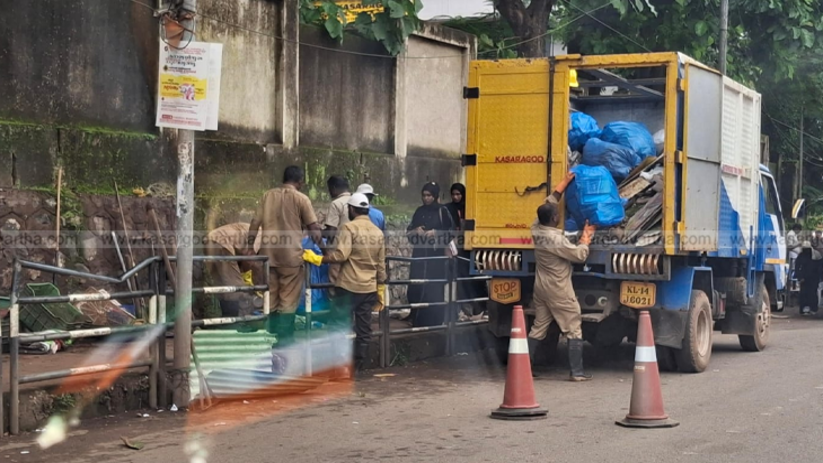 Garbage left behind by street vendors on a footpath in Kasaragod.