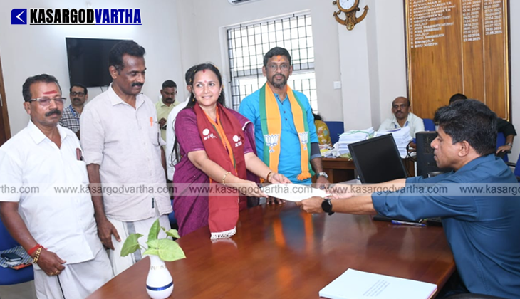  K Surendran filing nomination wearing Jai Tulunad shawl in 2026 election.