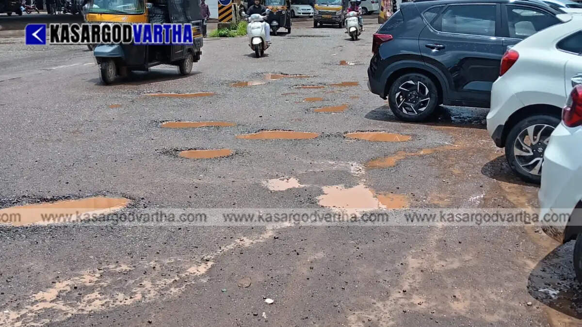 Representational image of heavily damaged road and potholes in Cherkala town