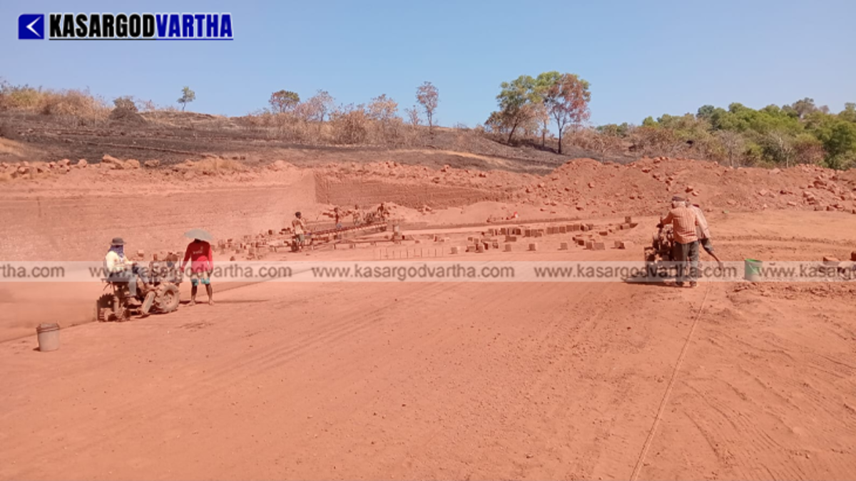 Dust rising from a laterite quarry near a residential area in Badriya Nagar