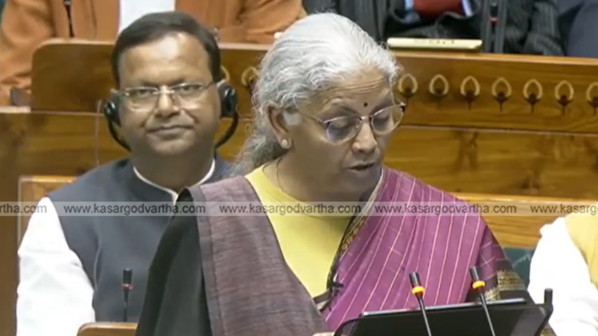 MPs in the Indian Parliament standing and protesting holding placards or shouting slogans.