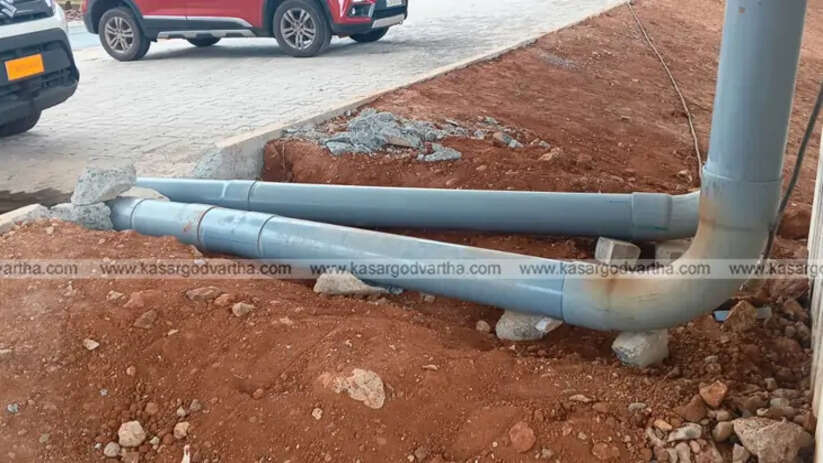 Rainwater falling from the elevated National Highway bridge in Kasargod.