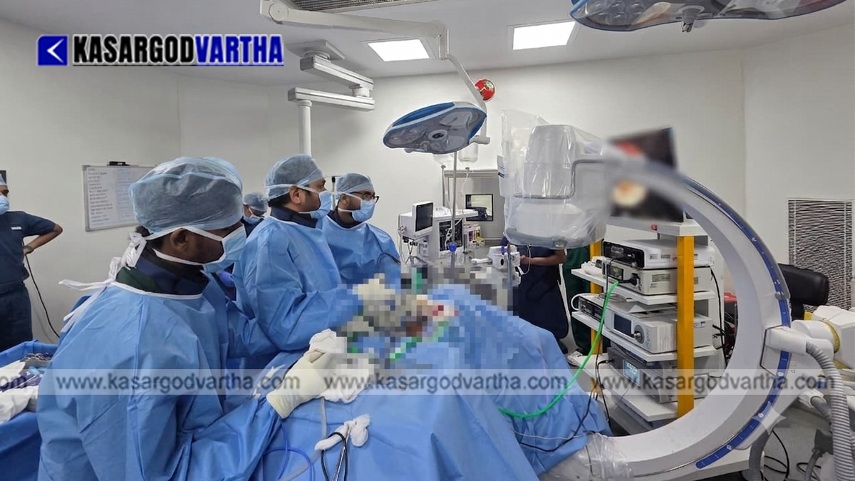 Medical team at Aster MIMS Kasaragod performing surgery