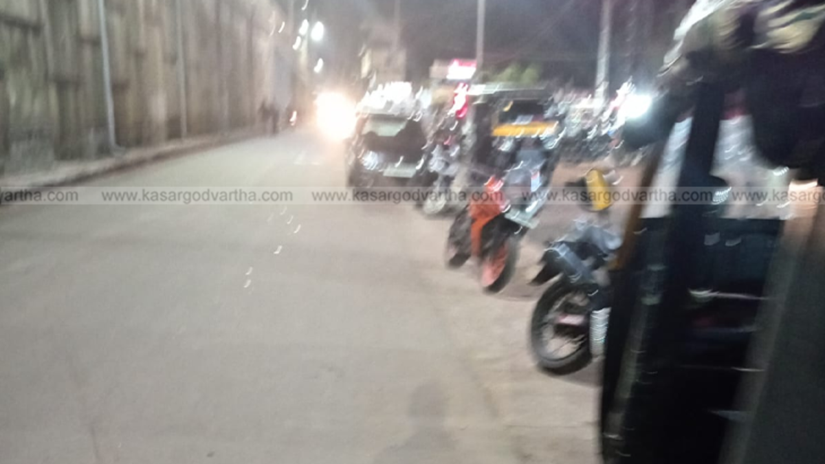 Cars parked illegally on the service road of NH-66 in Kasaragod.