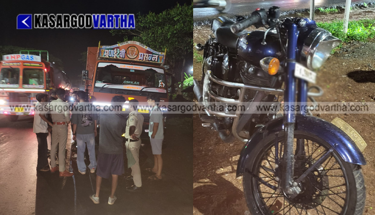 A representational image of a night-time road accident involving a heavy vehicle and a motorcycle.