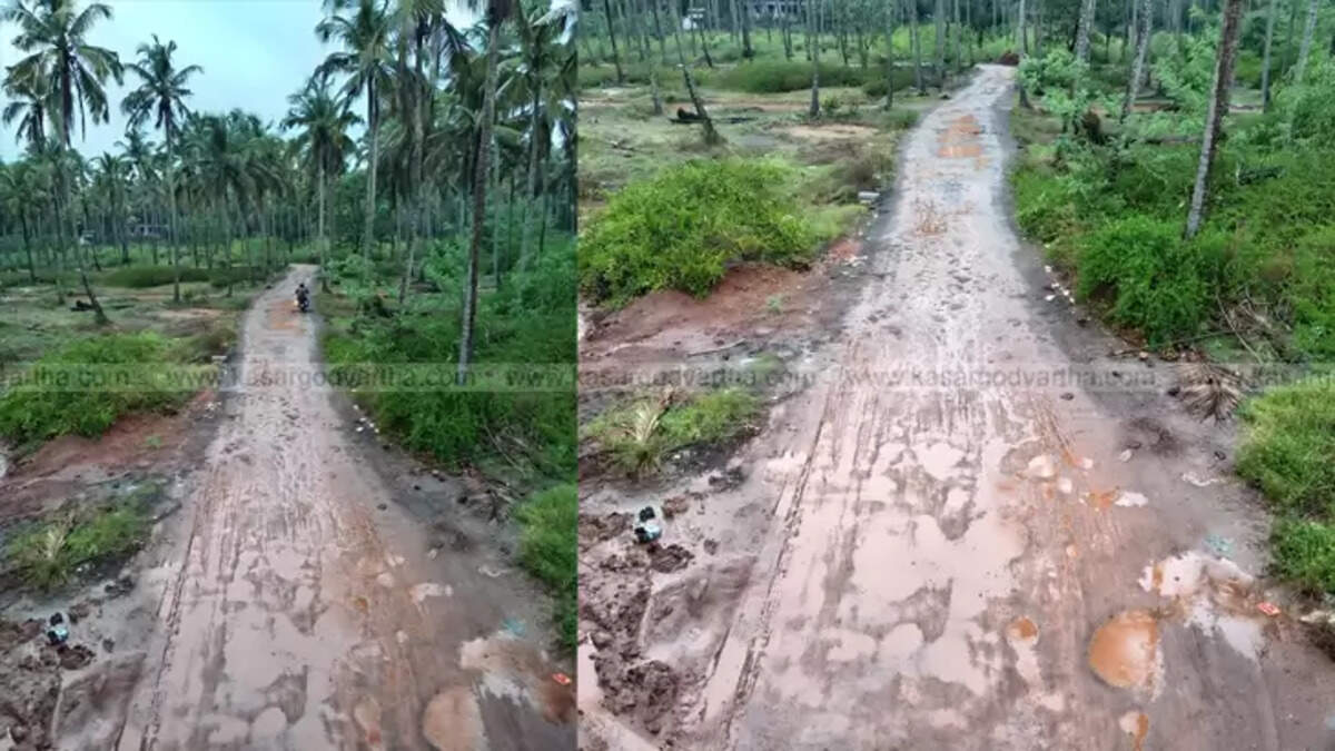 Mogral Koppalam railway underpass flooded with water and mud, making it impassable for vehicles.