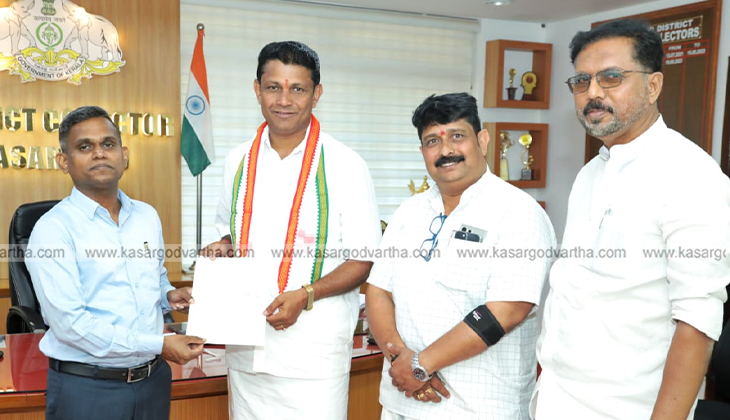 Election counting officials working on ballot boxes