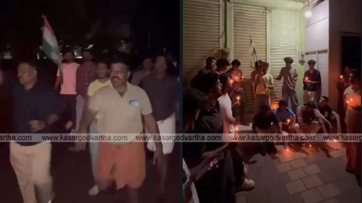 Youth Congress march with fire torches protesting electricity cuts in Padannakkad