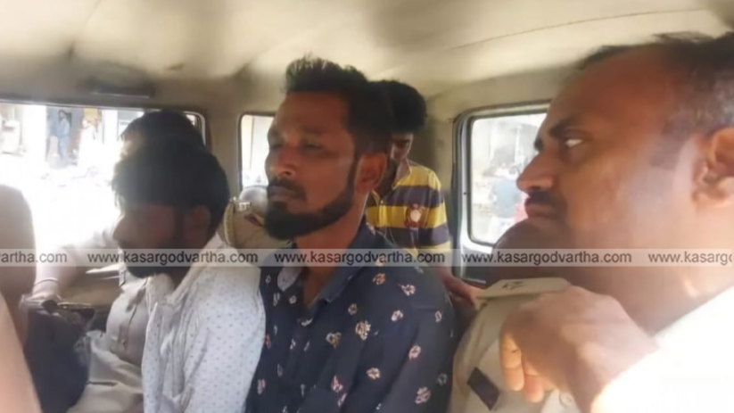 Forest officials arresting tiger poachers