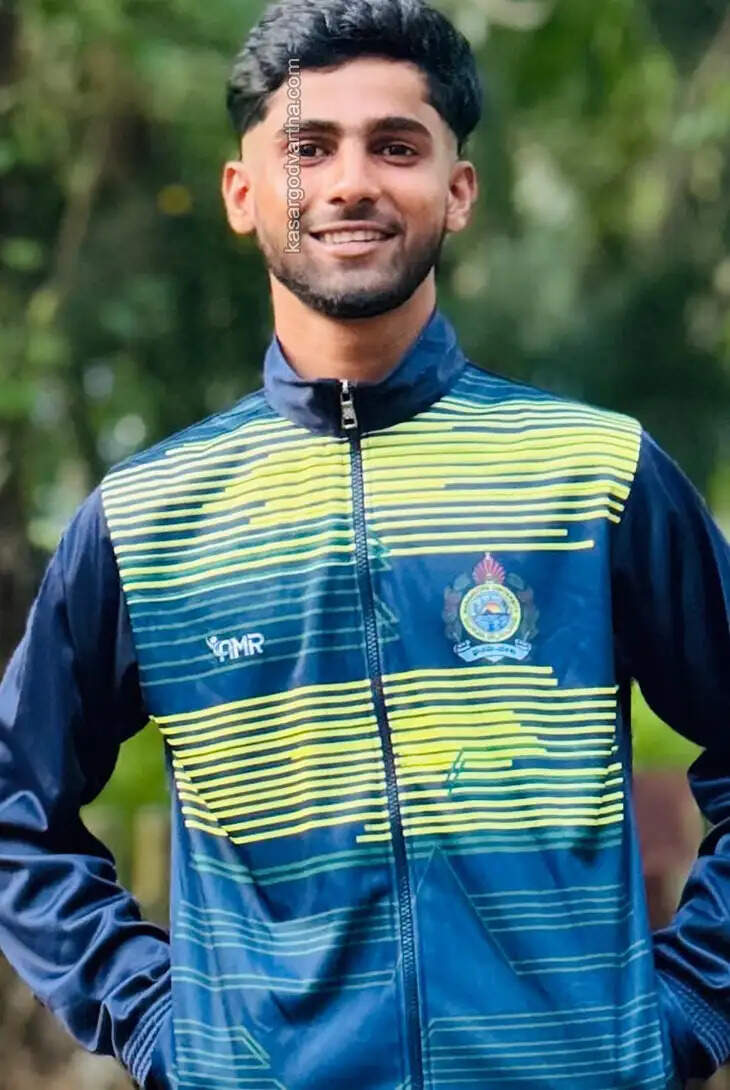 Five Kasaragod students selected for Mangalore University football team posing together.