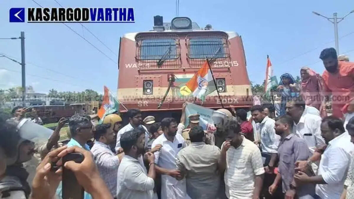 Massive protests in Kasaragod against fuel price hike; Youth Congress blocks train in Kanhangad, KSU marches pushing bikes.