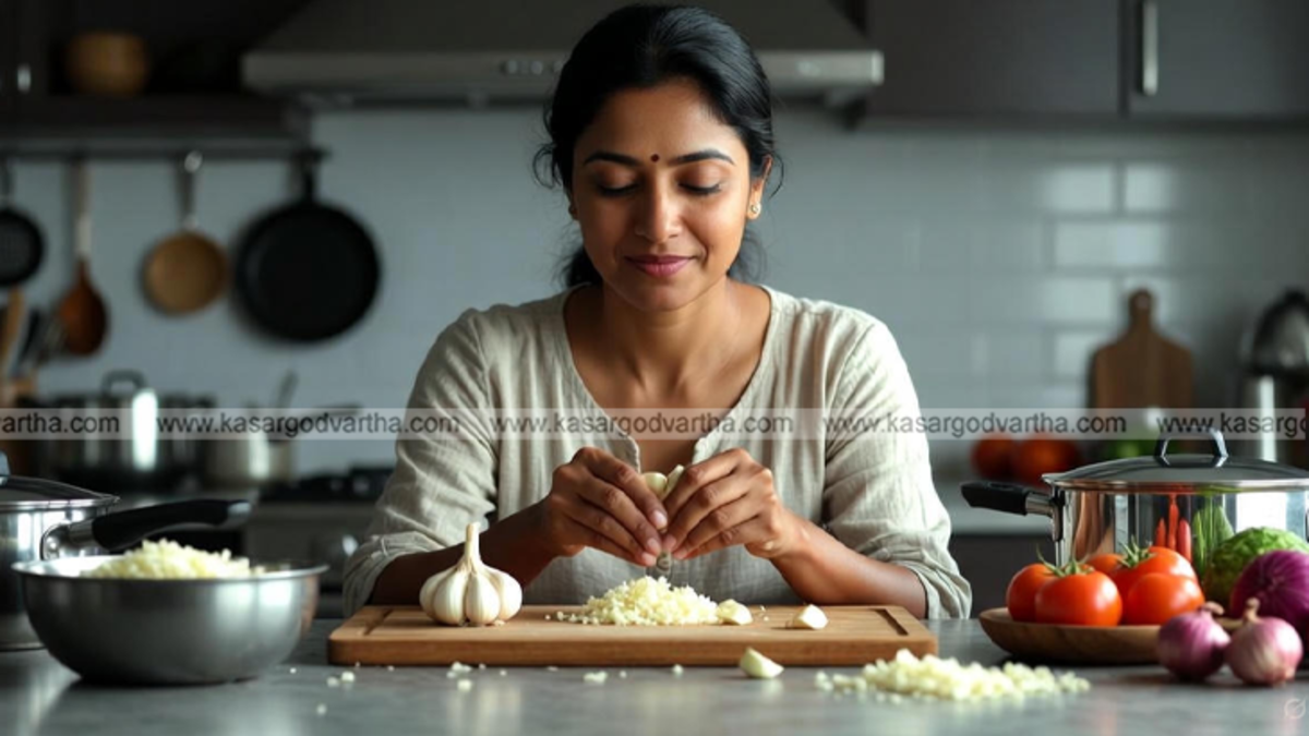  Crushed garlic on a wooden board