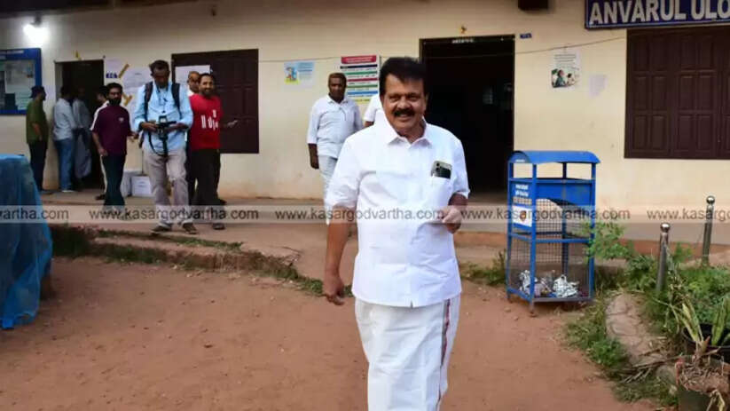 Voters queue up at a polling booth during the second phase of Kerala local body elections.