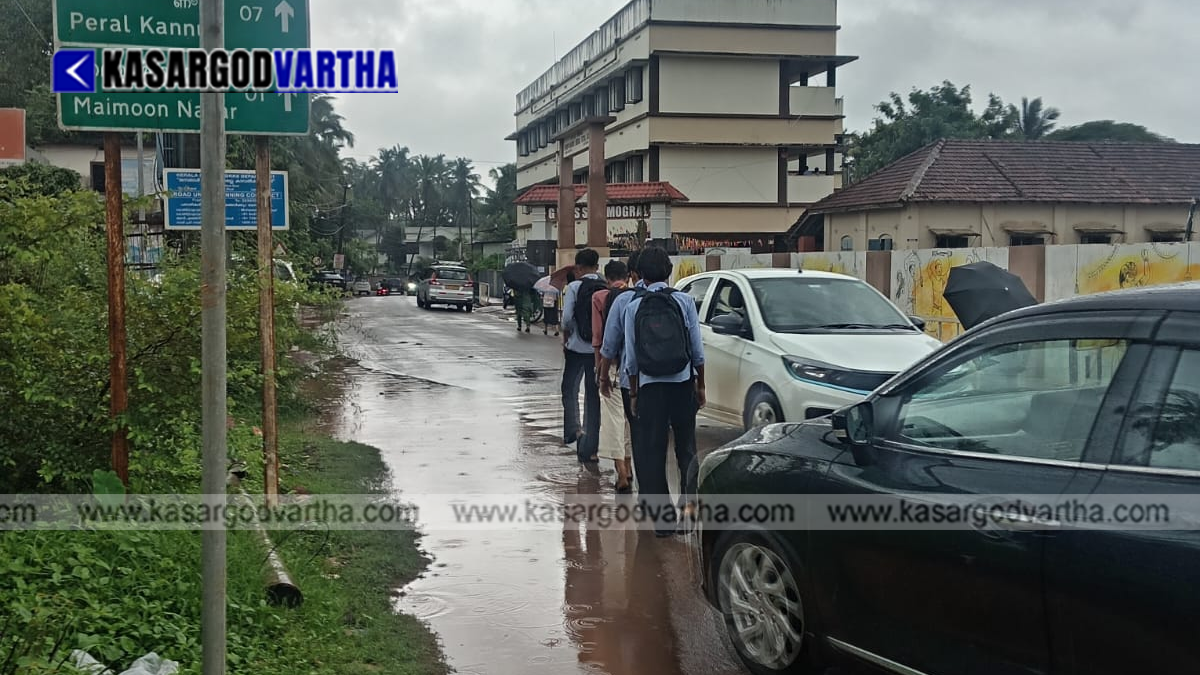 Waterlogged road at Mogral School Road