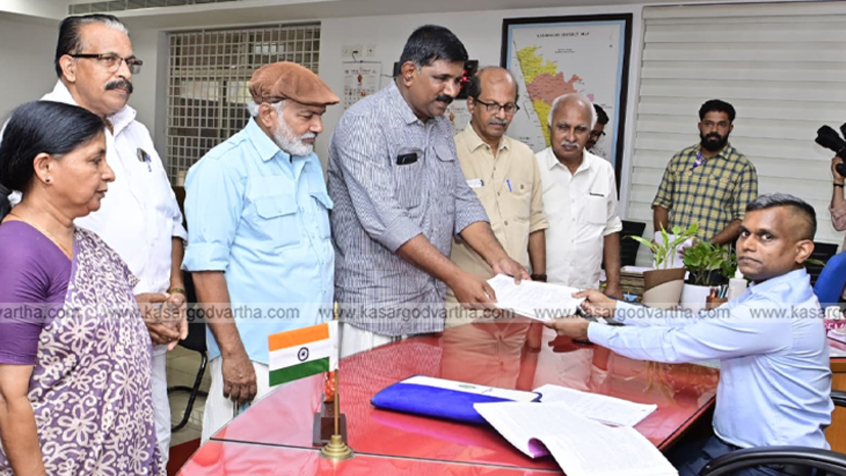 Candidates submitting nomination papers to the District Collector.