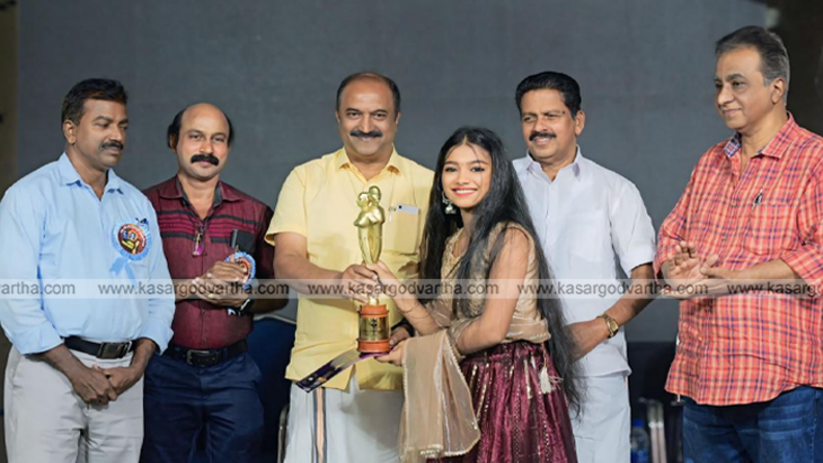 Avani Avooz receiving JC Daniel Foundation Award