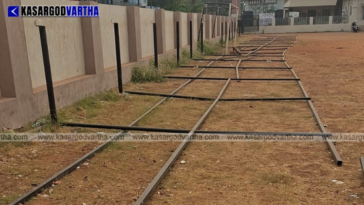 Collapsed heavy iron pillars lying on the Mogral school playground