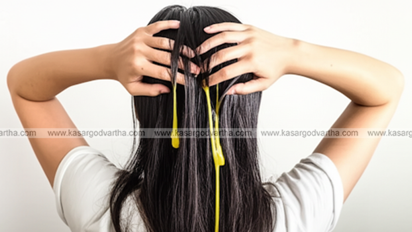 A woman applying a homemade egg hair mask.