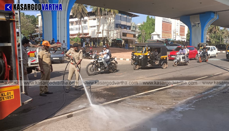 An overturned ambulance on the service road in Kasaragod Ashwini Nagar after a collision.