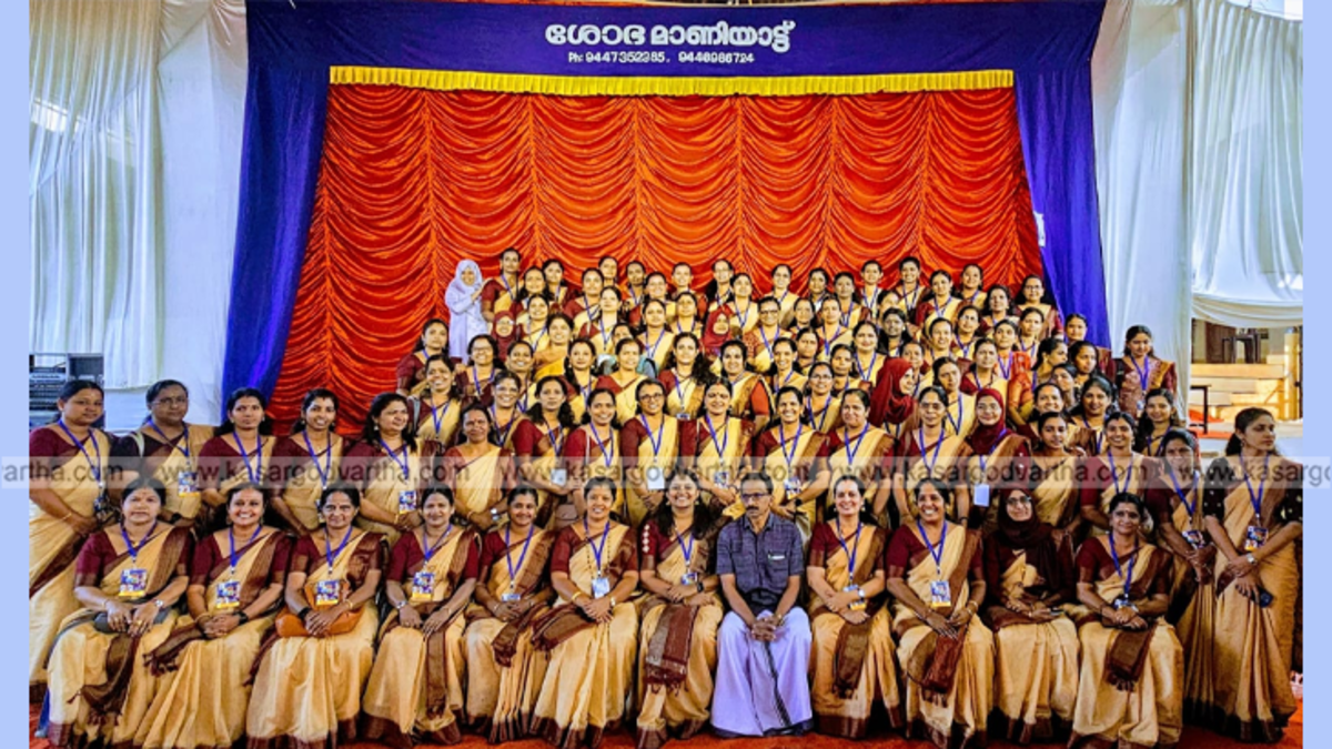 Teachers managing stage at Kasaragod School Arts Festival