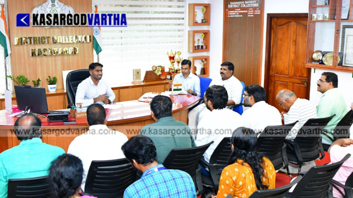  District Collector Arjun Pandian IAS holding an official project evaluation meeting with national highway authority officials.