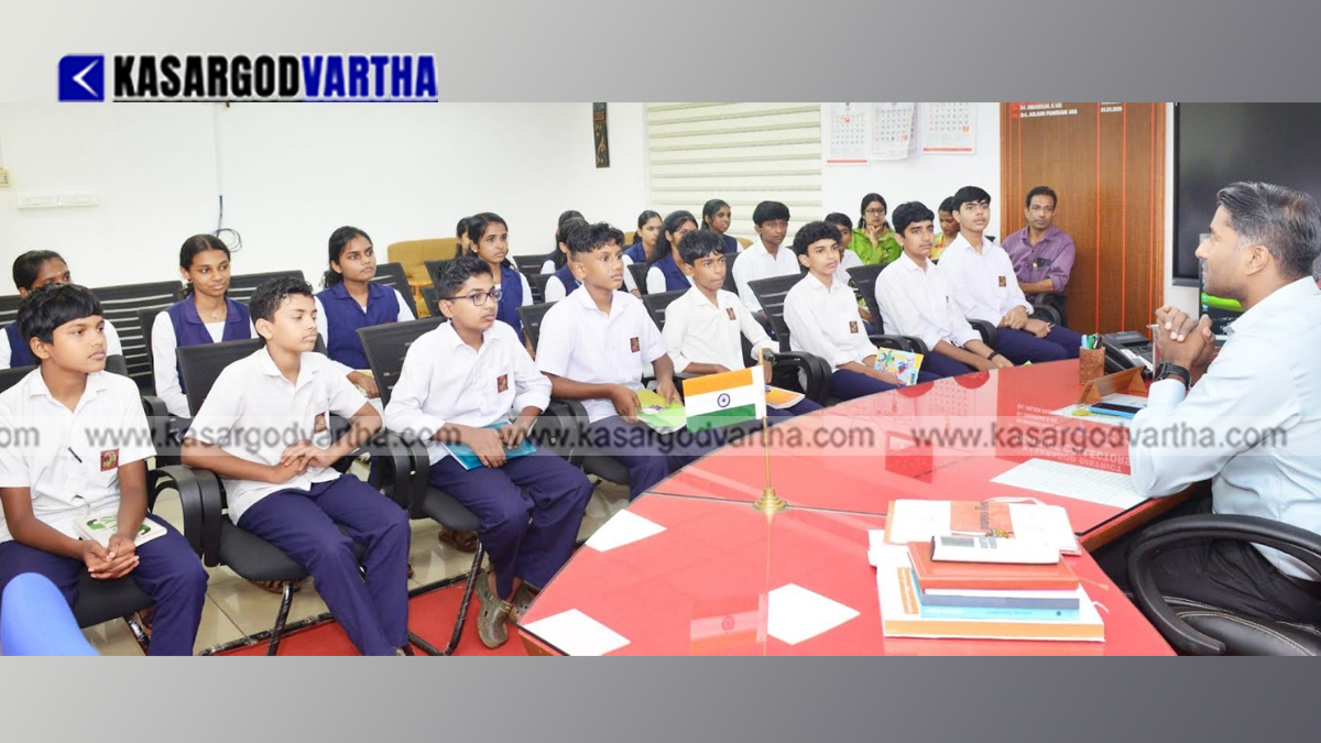 District Collector Arjun Pandia interacting with students