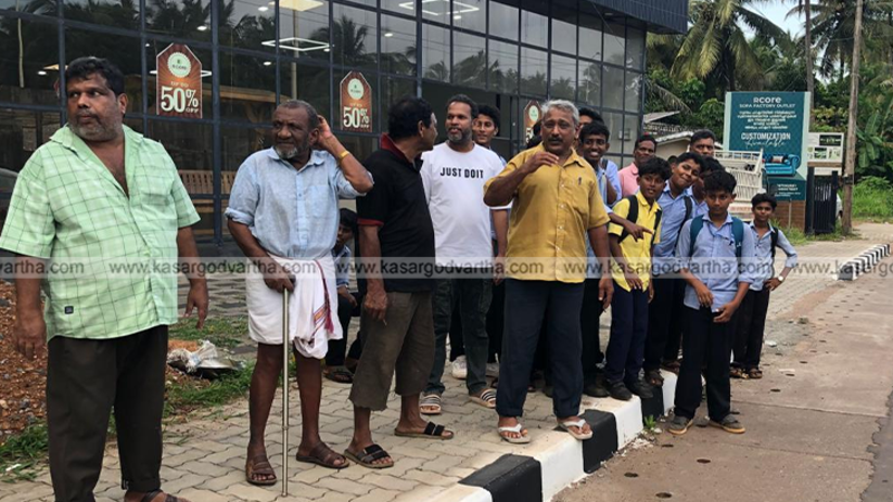 Empty bus stop area in Mogral where bus stops were removed