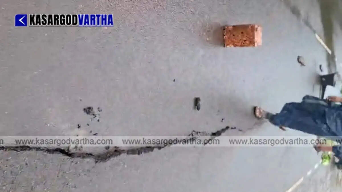 Cracks develop on newly constructed Macadam road in Kasaragod due to heavy rain; passengers at risk.
