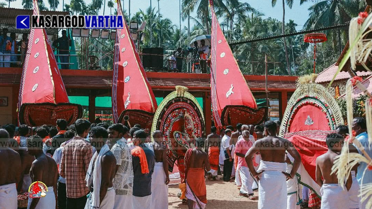 Image of a Theyyam artist adorned in traditional makeup and costume in North Malabar